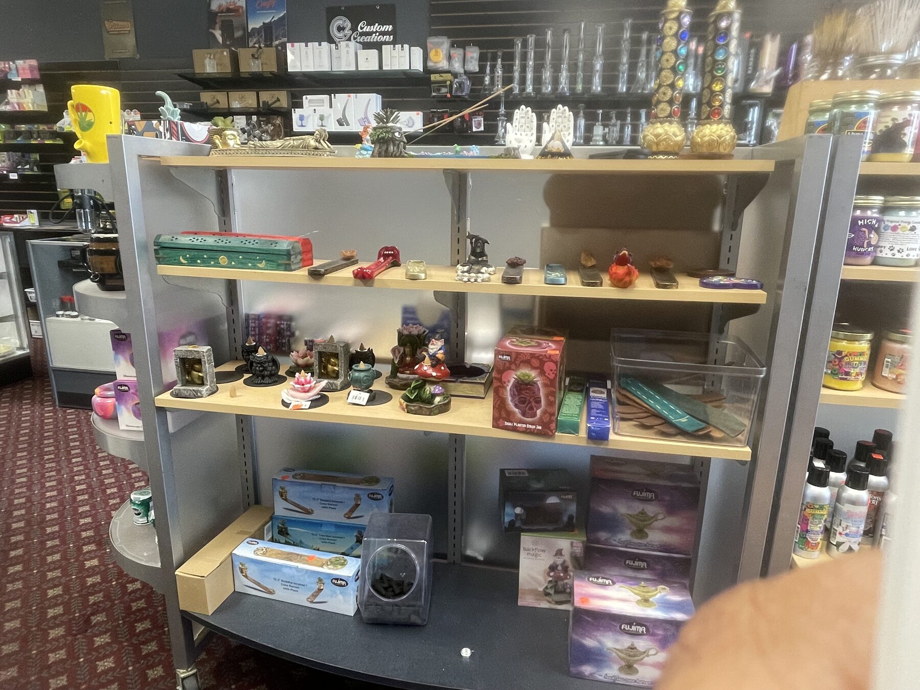 Giftable accessories and novelty items displayed near the counter