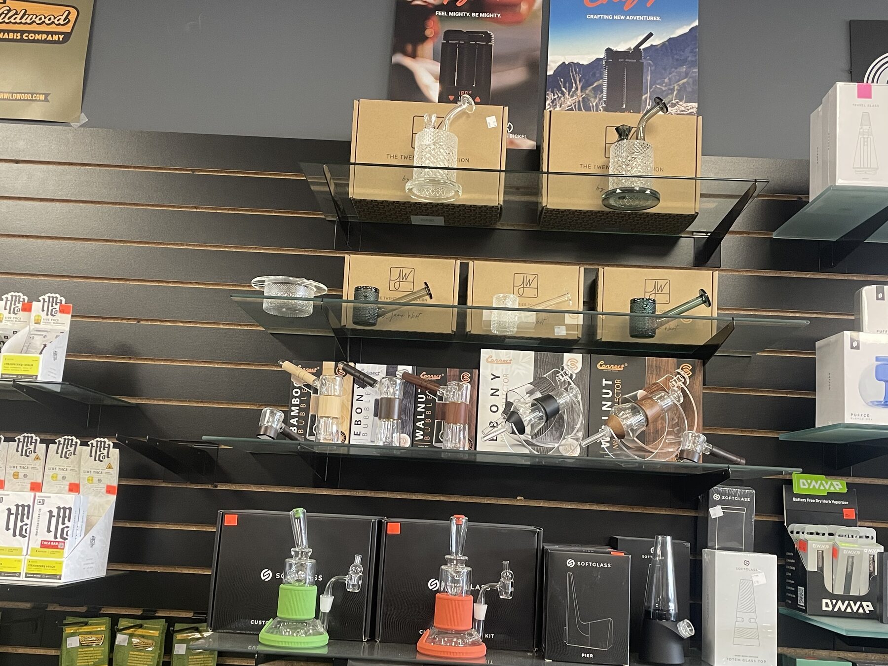 Hand pipes and compact glass pieces displayed in the shop