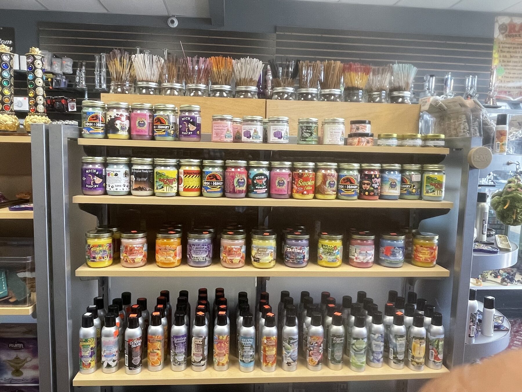 Jars, bottles, and packaged hemp-derived products on a display shelf