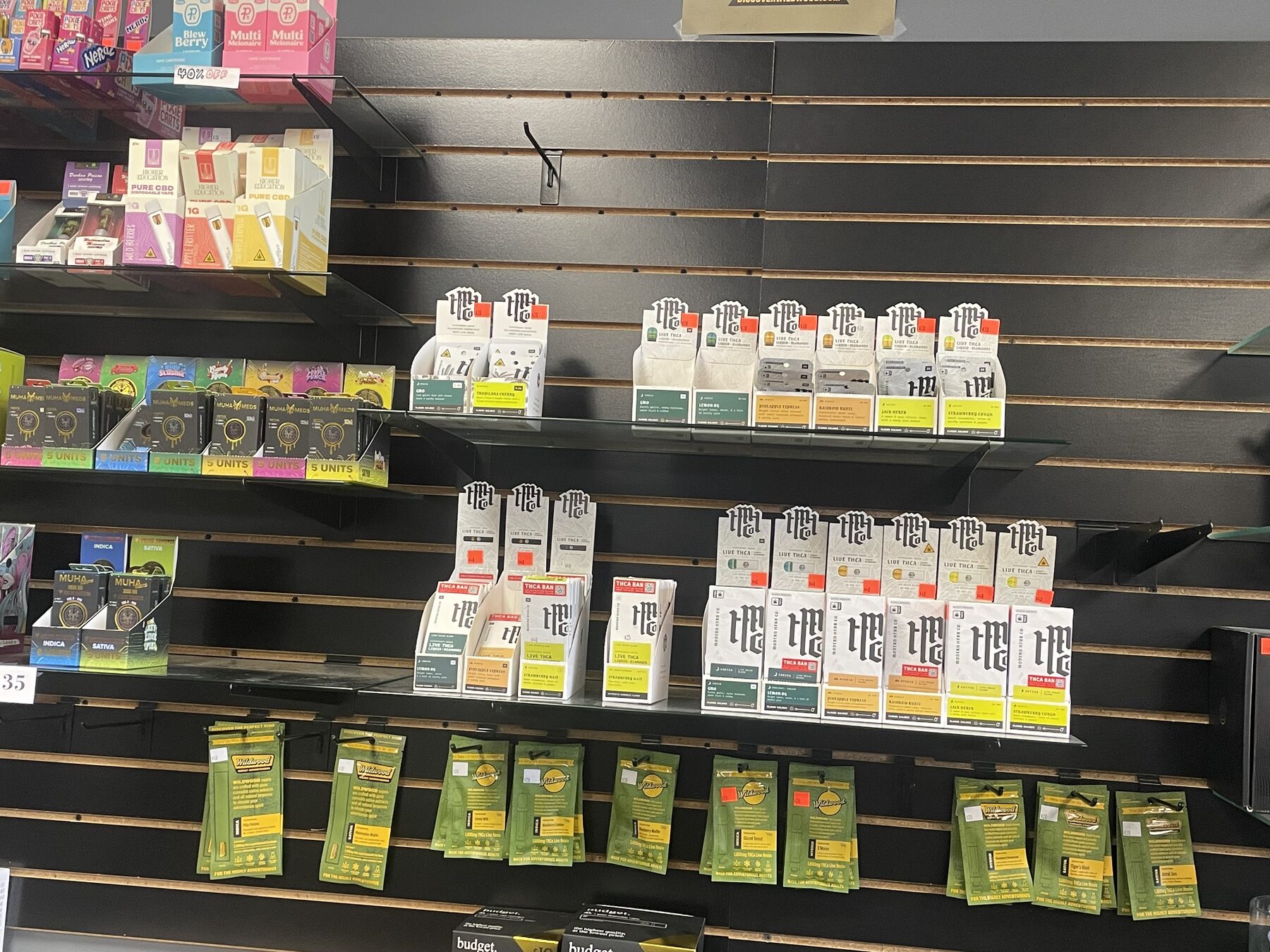 Packaged vapor essentials arranged across store shelves